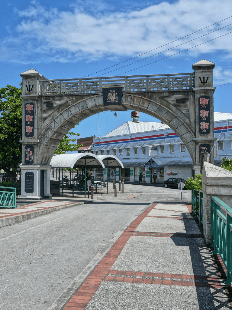 Historic Gateway arch at Quest for Directions in Nassau, Bahamas, welcoming visitors.