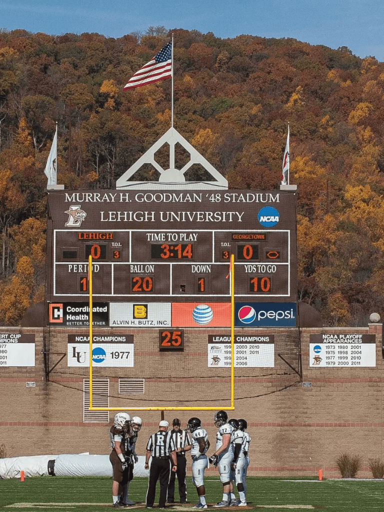 High school football scoreboard at Lehigh University’s Murray H. Goodman Stadium, featuring teams from Lehigh and Georgetown.
