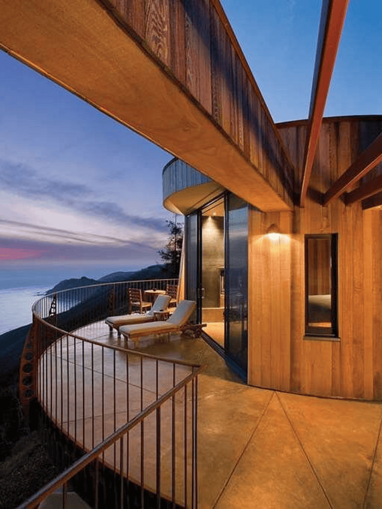 Stunning mountain view balcony with wooden accents at QuestForDirections, luxury outdoor retreat.