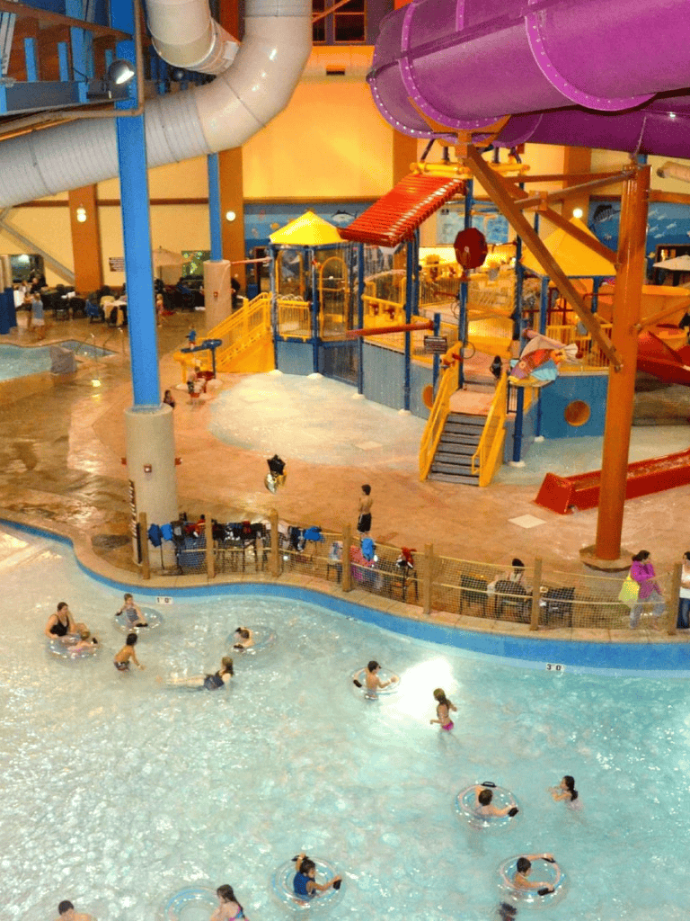 Indoor water park with slides and pools for family fun and entertainment.