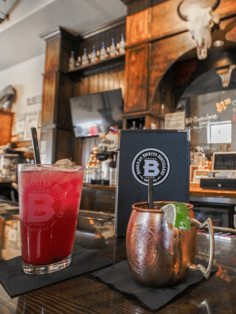 Refreshing cocktails at QuestForDirections bar with rustic decor and creative drinks.