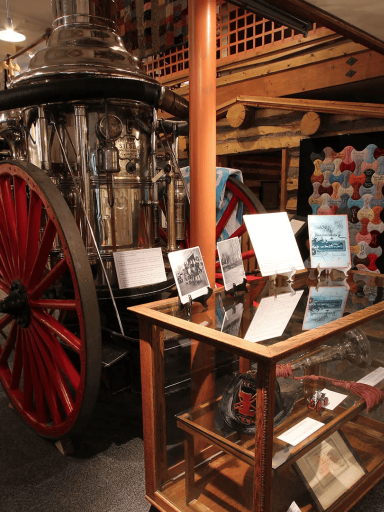 Antique fire truck and historical exhibits at Quest for Directions museum.