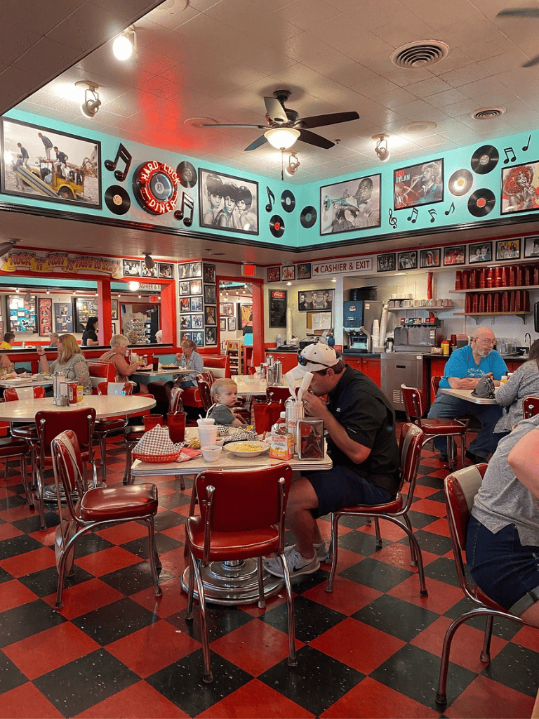 1. Vintage diner interior with retro music decor and family dining atmosphere.