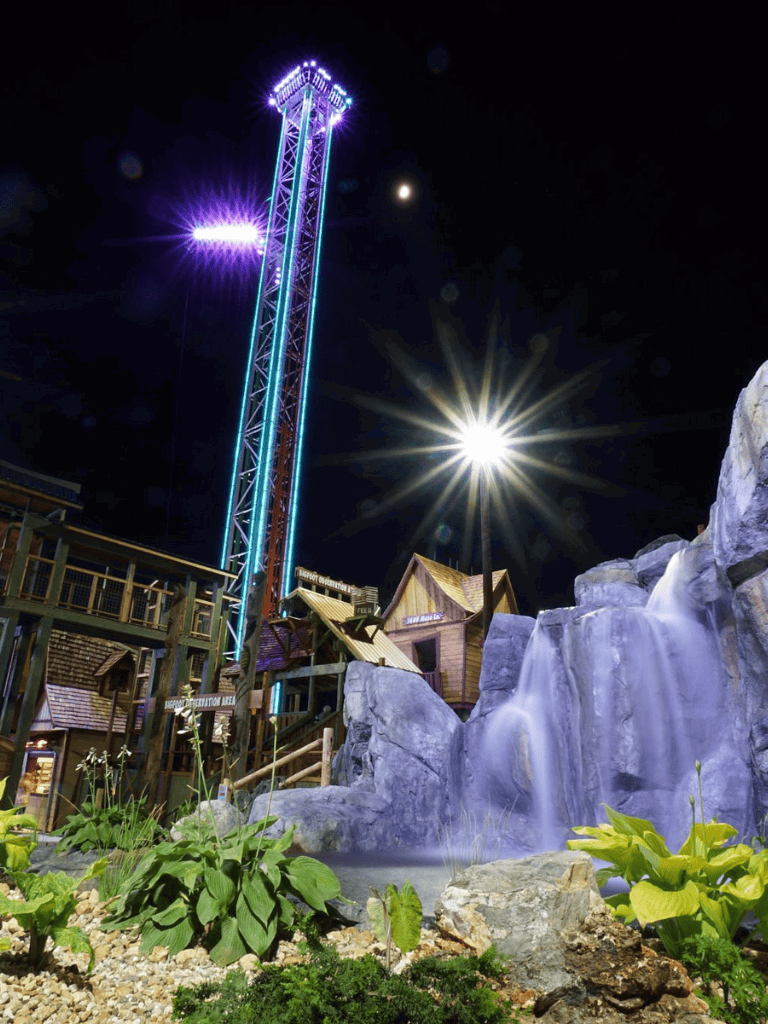 1. Illumination ride at QuestForDirections amusement park at night.