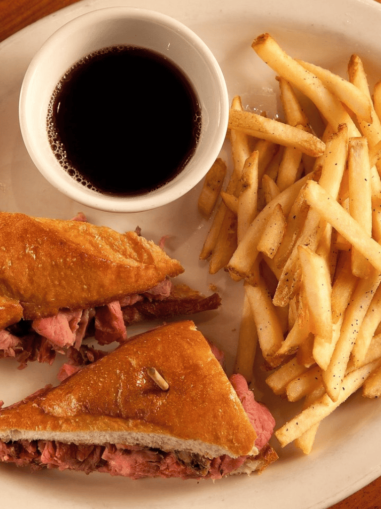 Juicy Roast Beef Sandwich with French Fries and Soft Drink.
