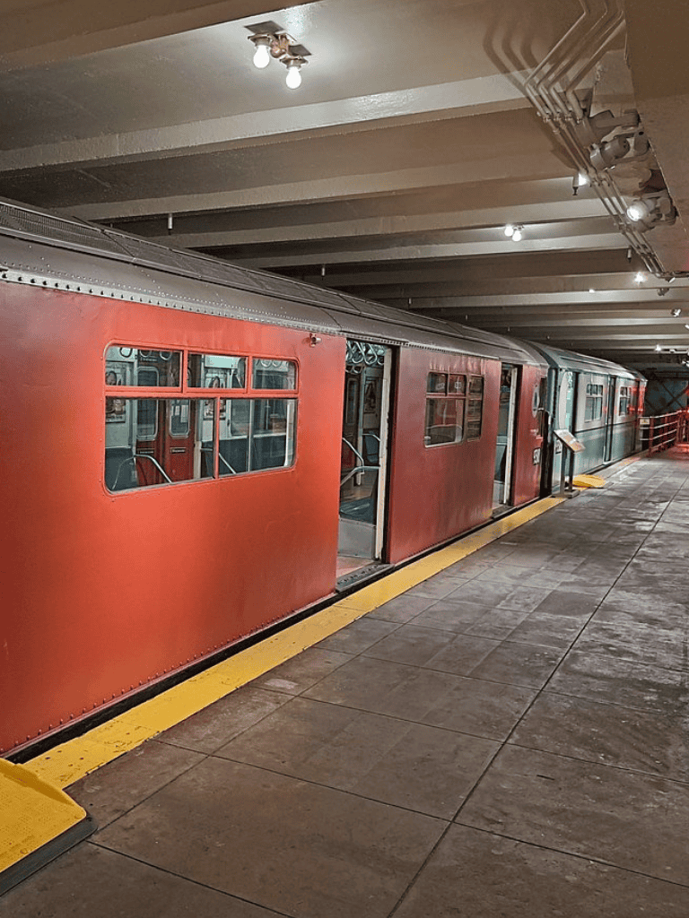 Vintage subway train at underground station, urban transit station, public transportation, QuestForDirections.