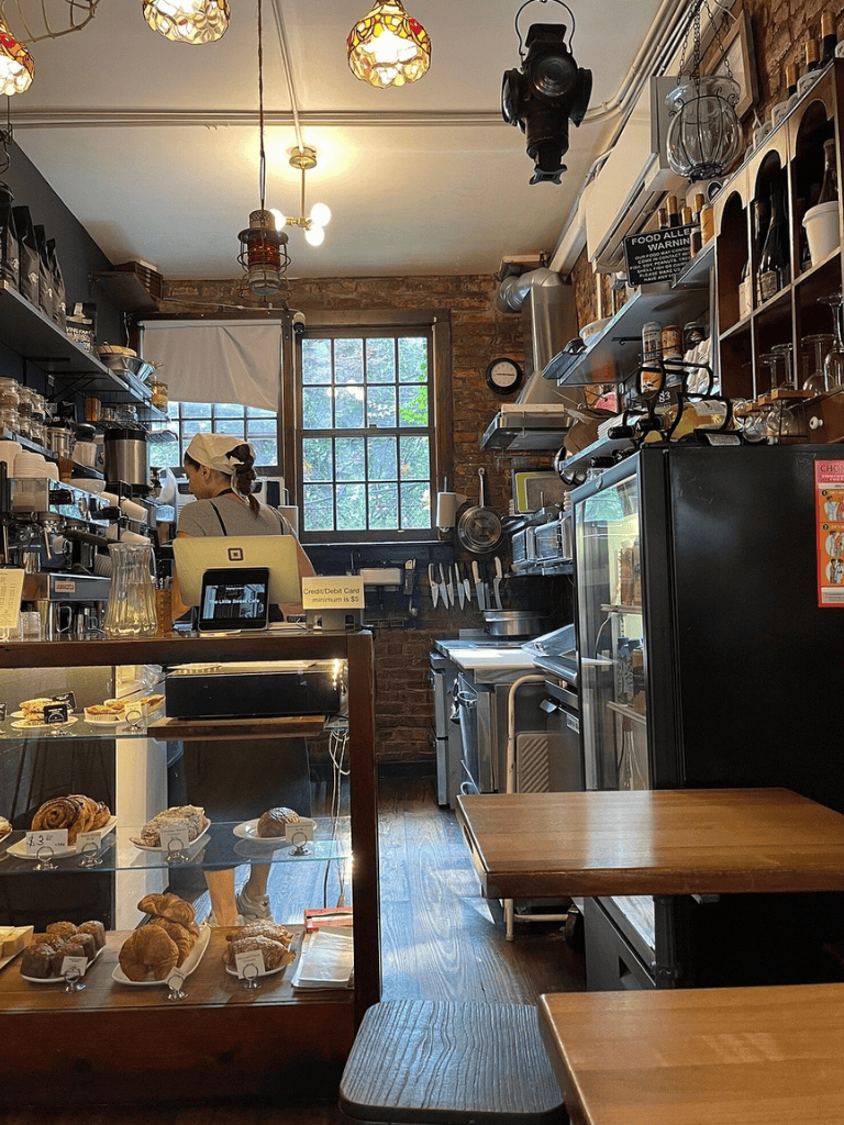 Freshly baked pastries and cozy cafe atmosphere at QuestForDirections coffee shop.