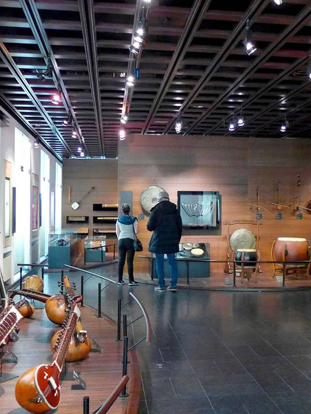 Colorful musical instruments display at Museum of Indigenous Arts, featuring traditional Native American artifacts and cultural exhibits.