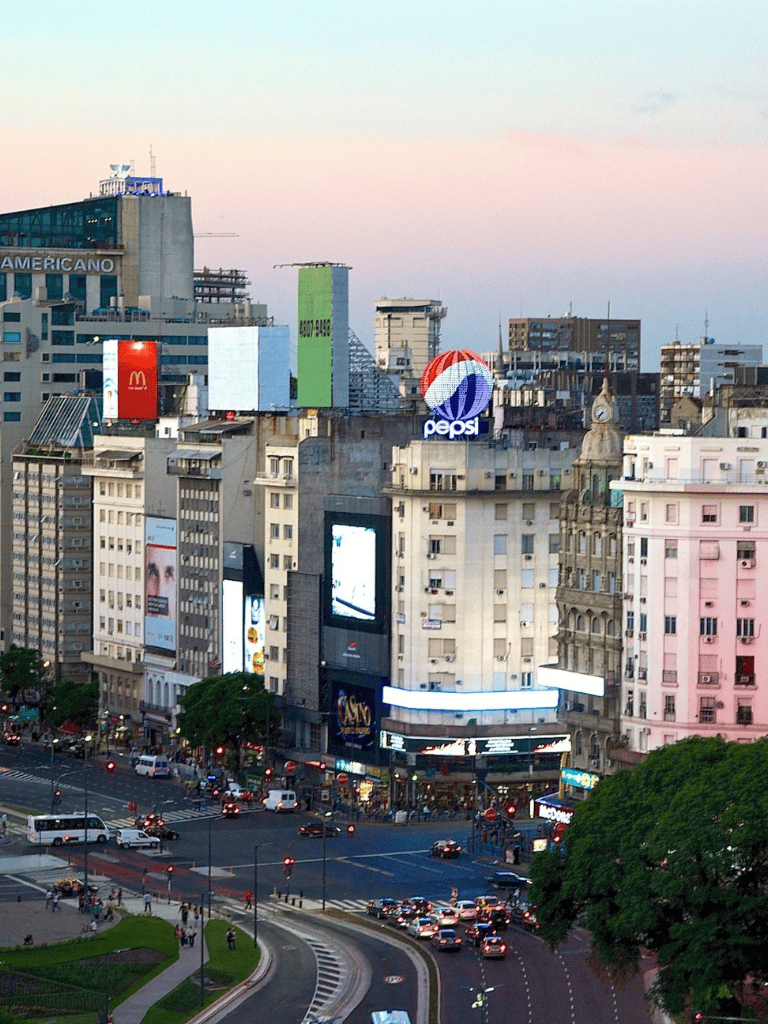 Bright cityscape with iconic billboards and bustling streets in downtown.