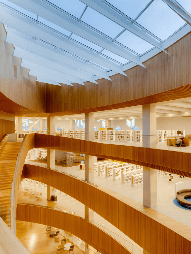 Modern library interior showcasing innovative design and spacious reading areas at QuestForDirections.