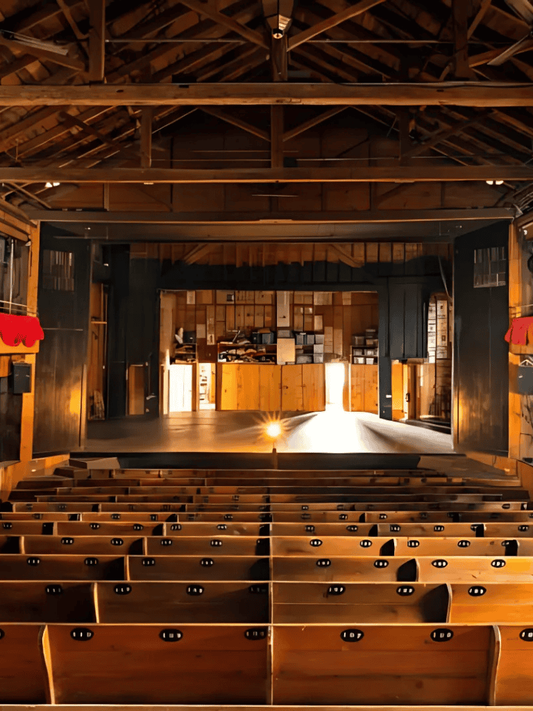 Cozy wooden theater stage with seating, perfect for events at QuestForDirections.