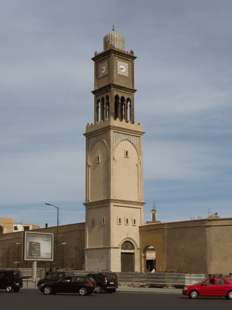 Historic clock tower in Tunis Morocco, traditional architecture, city landmark, local sightseeing spot, cultural history.
