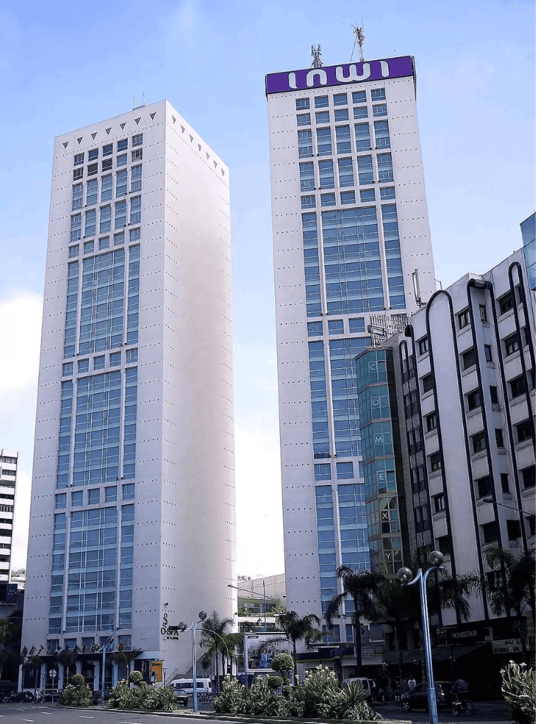 Modern high-rise office buildings in an urban cityscape with Clear blue sky.