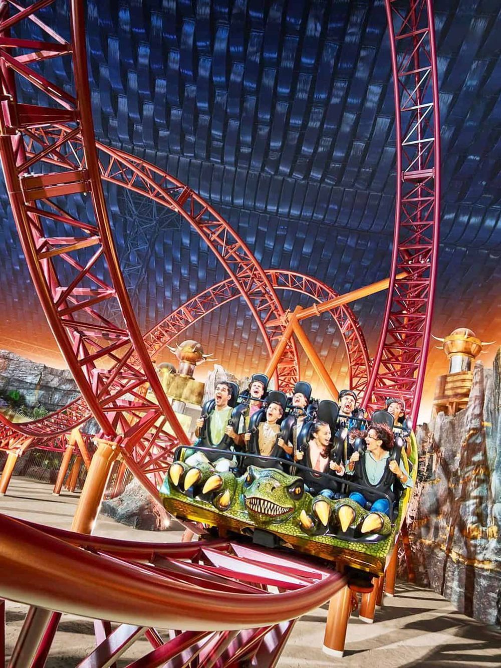 Thrilling roller coaster ride at Quest for Directions theme park, featuring a dragon-themed coaster and exciting twists and turns.