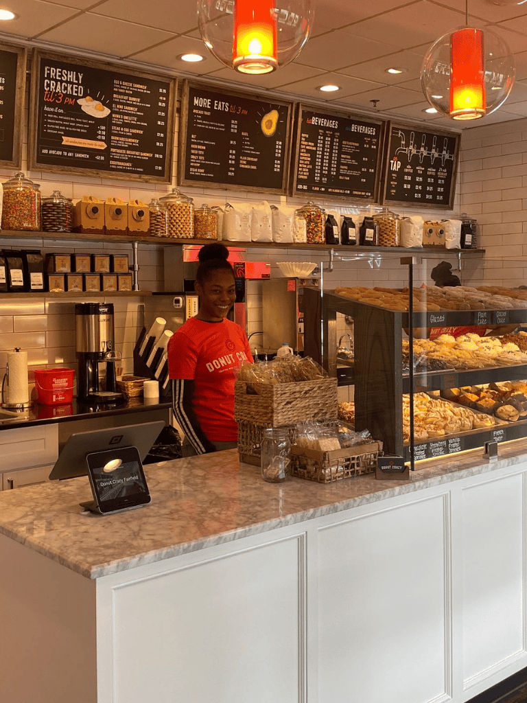 Freshly baked donuts and coffee served at QuestForDirections bakery.
