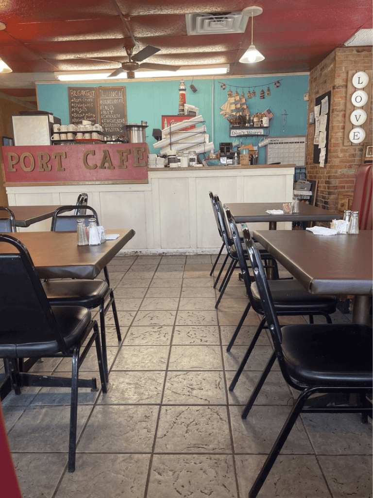 Cozy breakfast spot at Port Cafe with casual seating and inviting decor, perfect for morning dining.