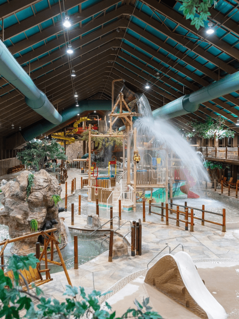 Indoor water park with slides and water zones at QuestForDirections.