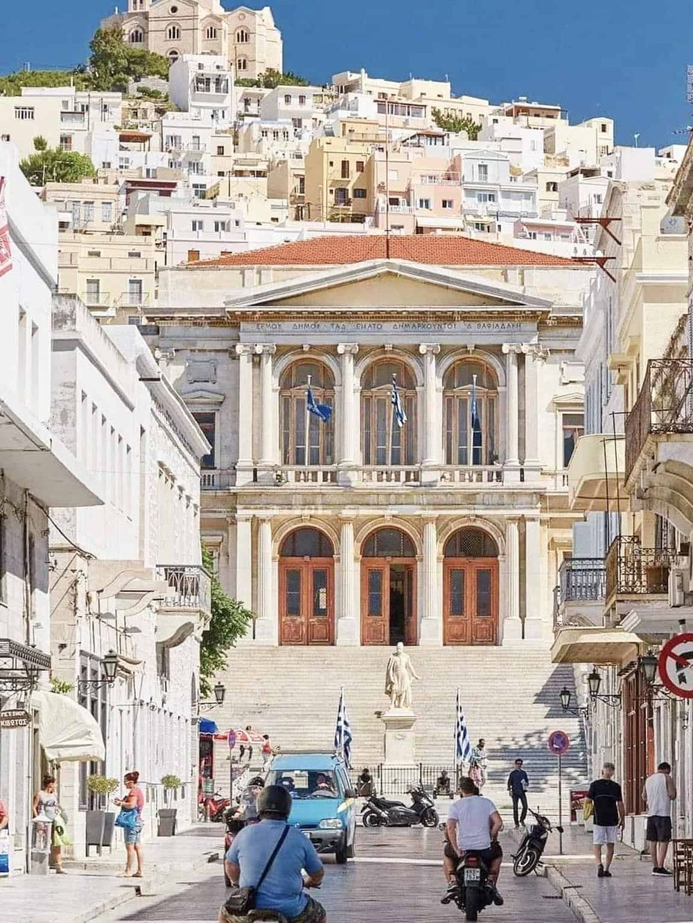 1. Greek Parliament building in Athens with historic architecture and flags.