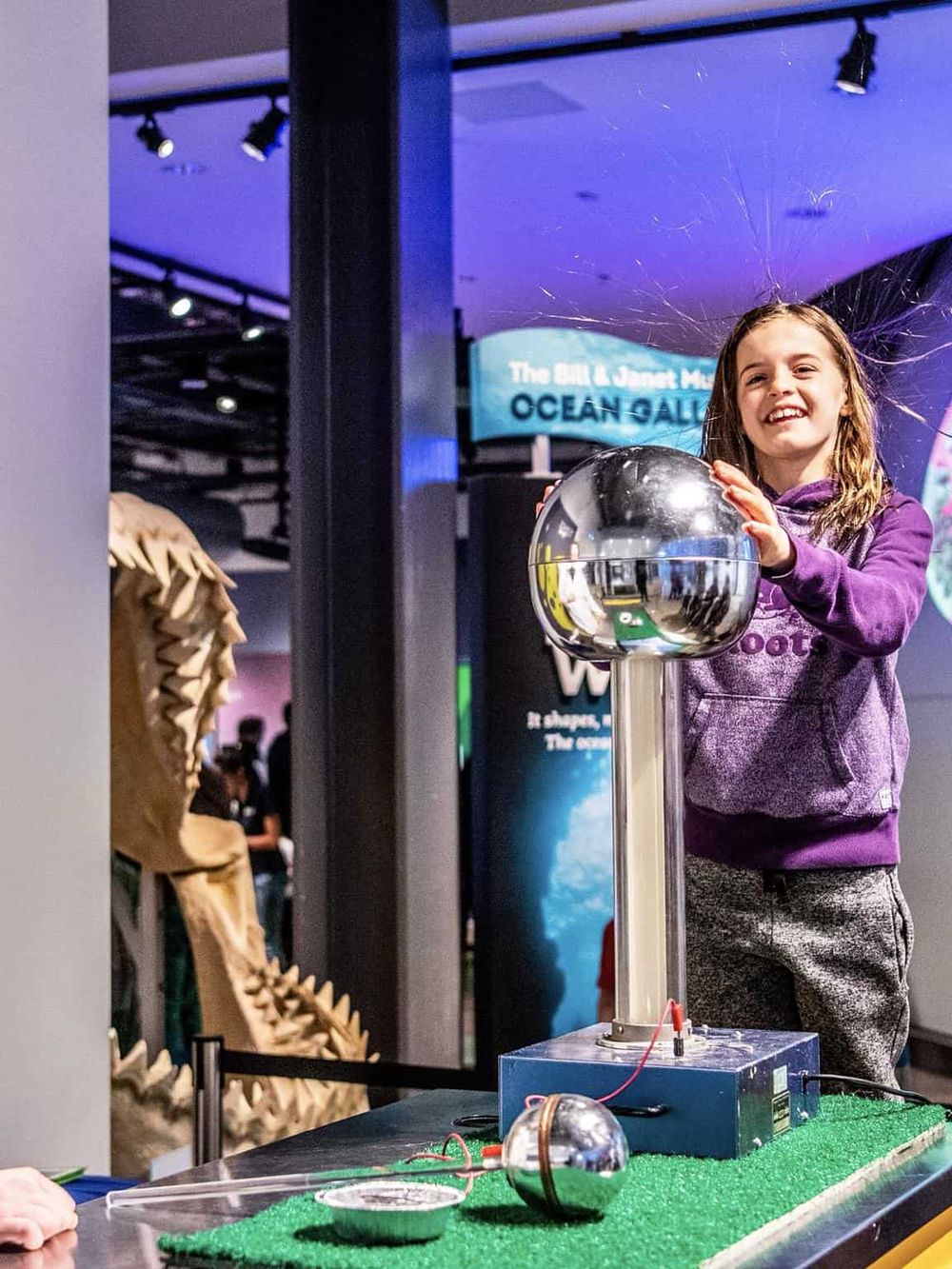 Glow in the dark science exhibit at Quest for Directions, inspiring curiosity and learning about ocean life.