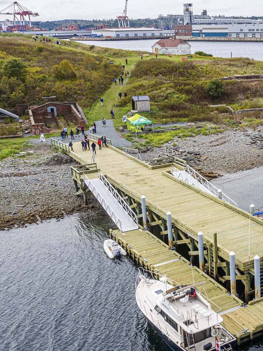 1. Beautiful waterfront dock with boat and scenic views for outdoor exploration.