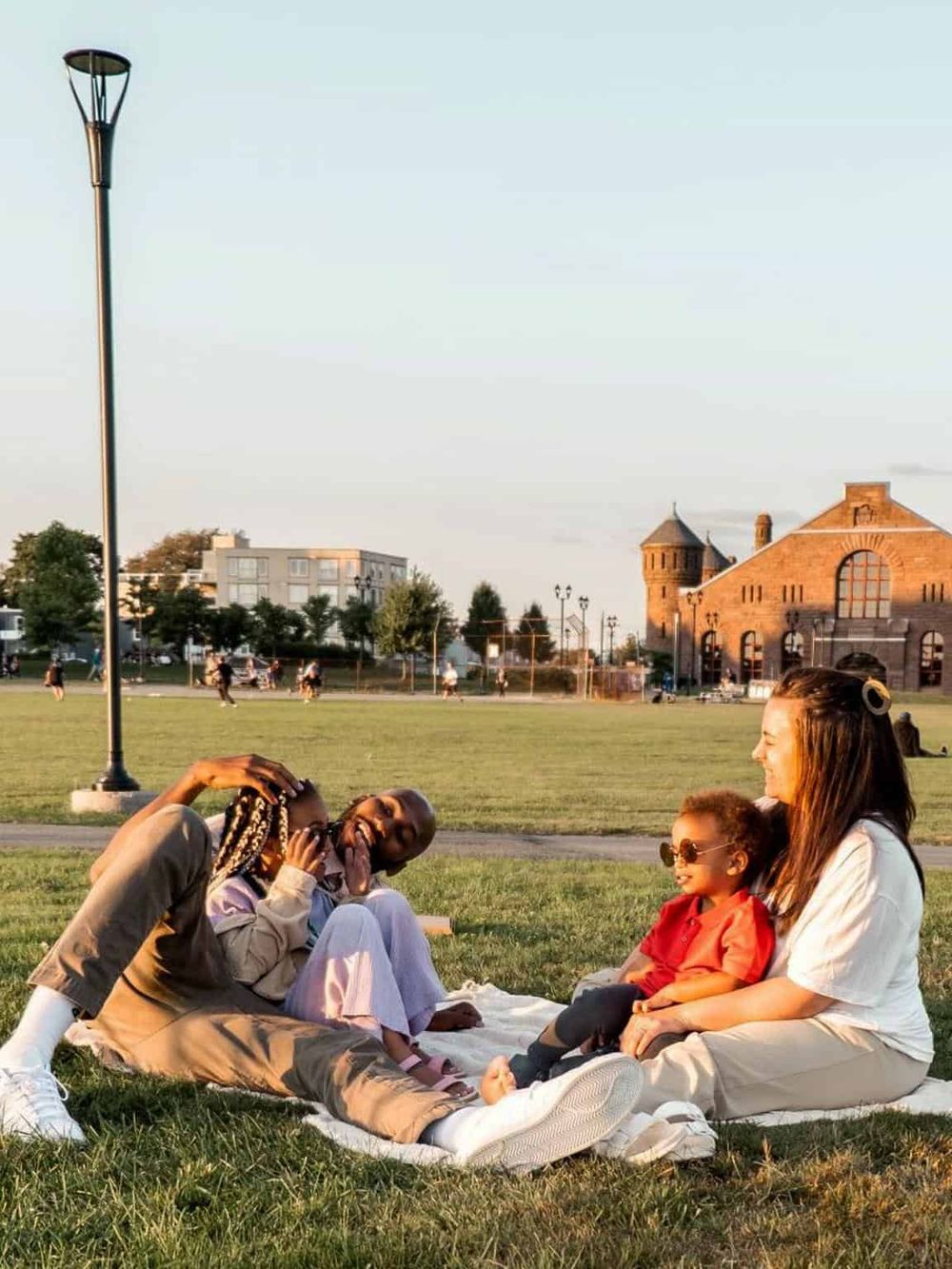 Family enjoying a picnic in a park, highlighting family-friendly activities and outdoor recreation.