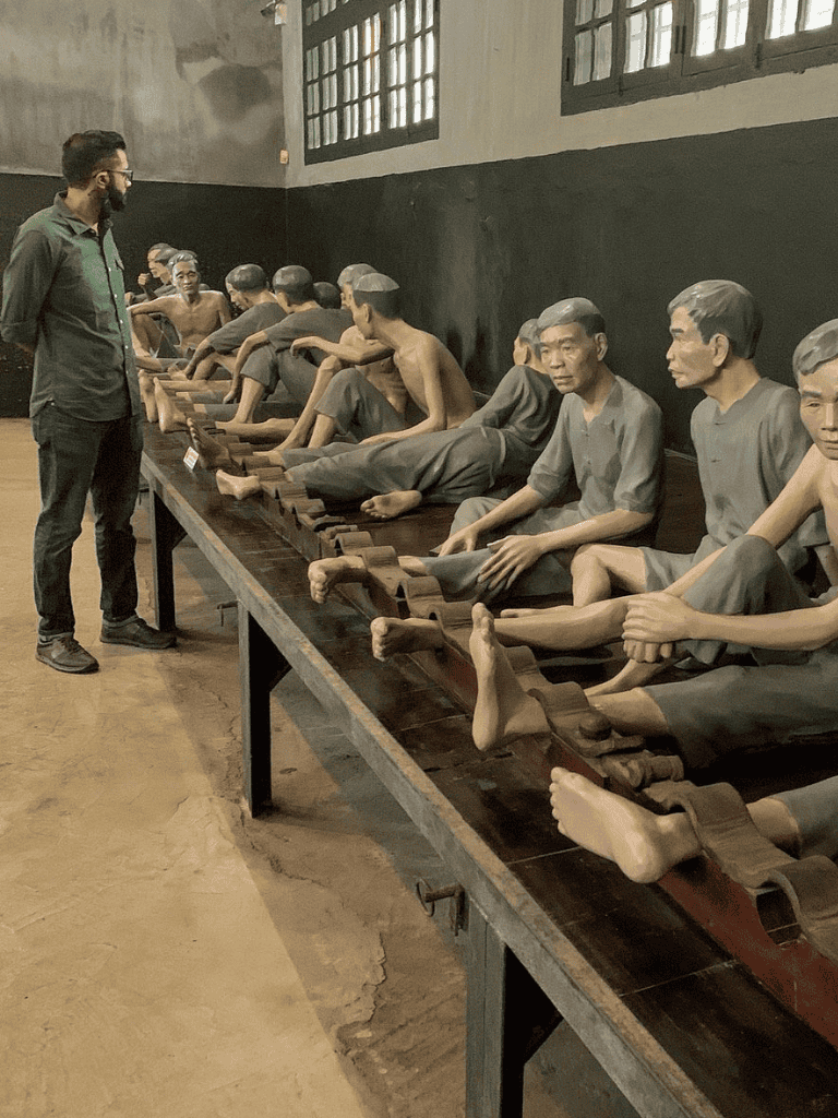 Dead bodies museum exhibit in Vietnam showing photorealistic statues of war victims and survivors.