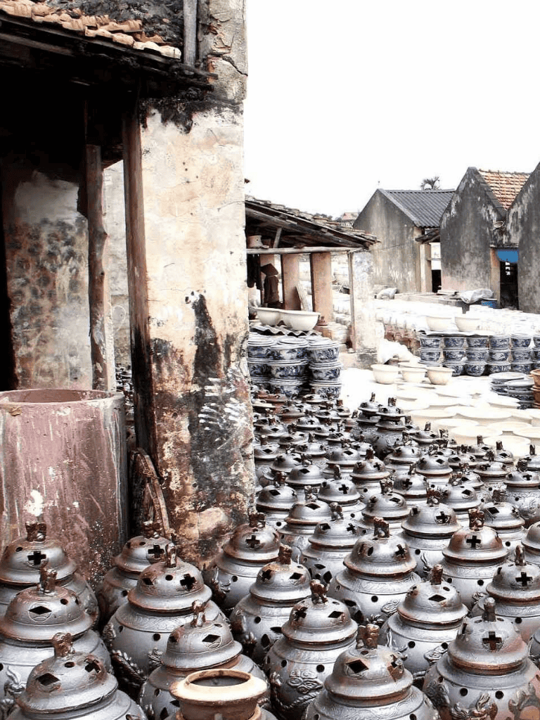 Rustic ceramic lanterns outdoor market, traditional handmade rural crafts, authentic local artisan pottery, QuestForDirections.