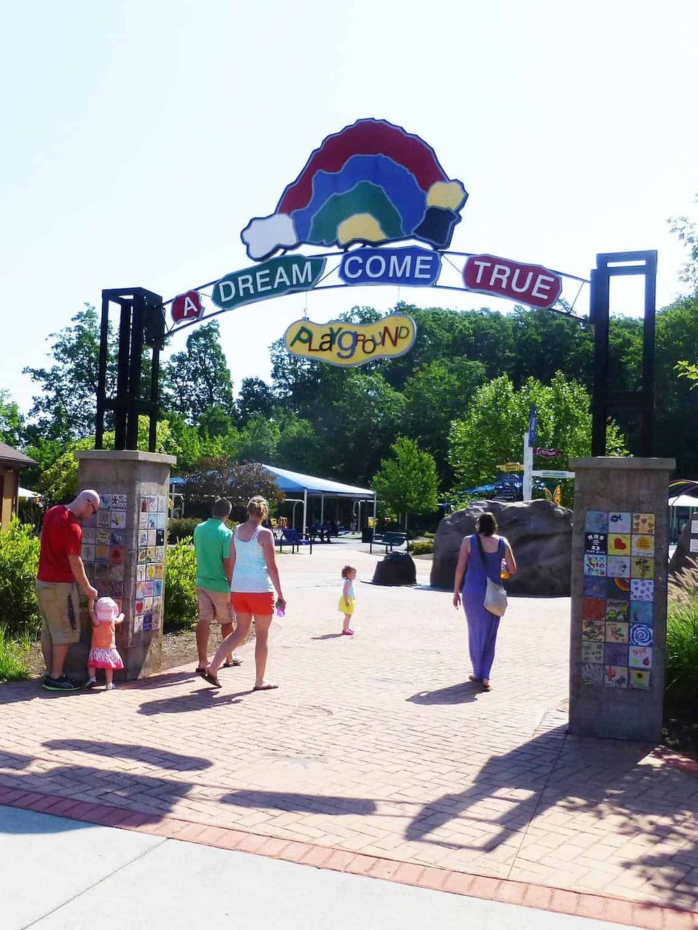 Colorful playground entrance at Quest for Directions amusement park, family-friendly fun and outdoor activities.