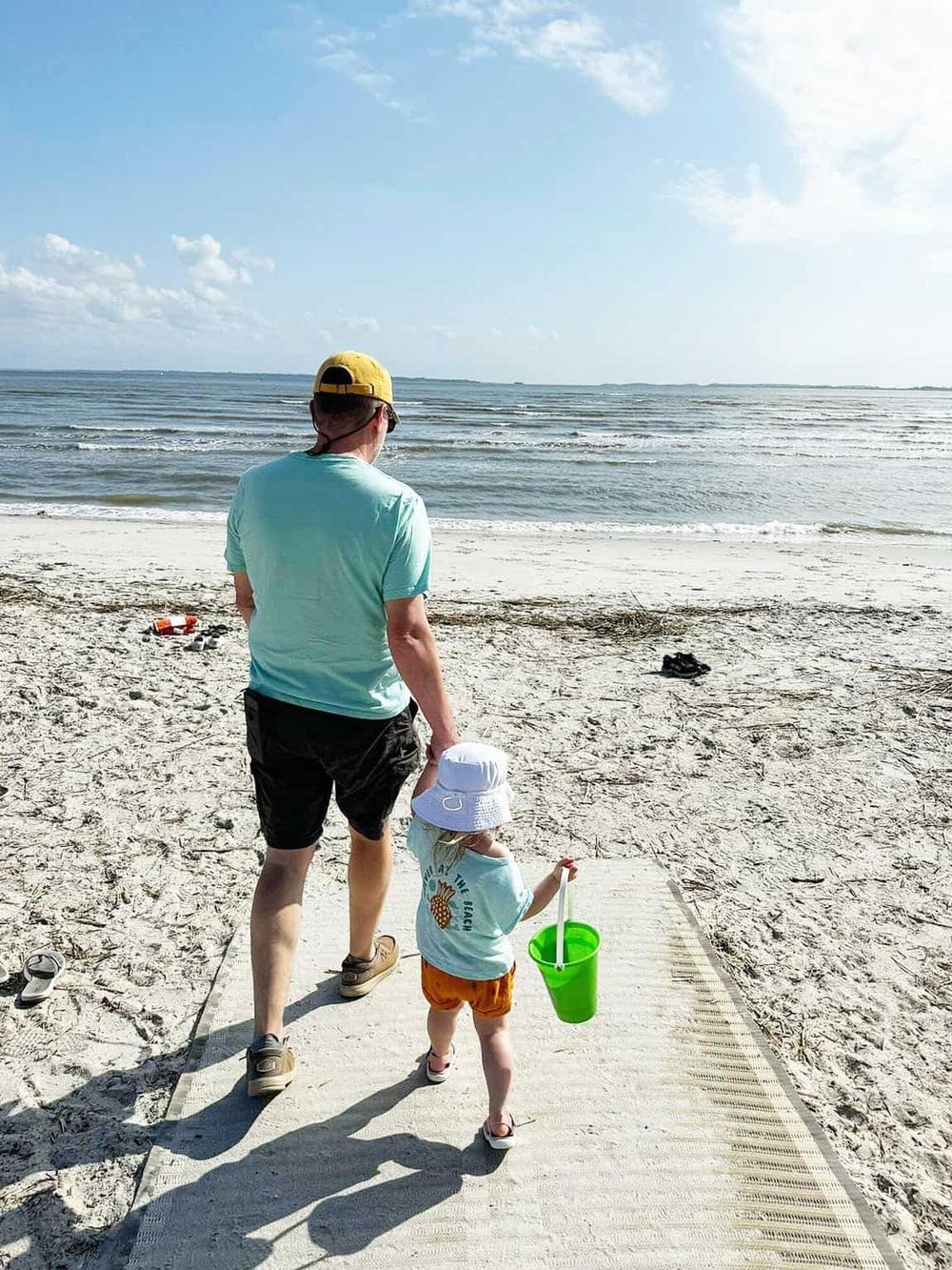 Beach family fun at the water's edge with sand, surf, and scenic ocean views. Perfect for relaxation and seaside activities.
