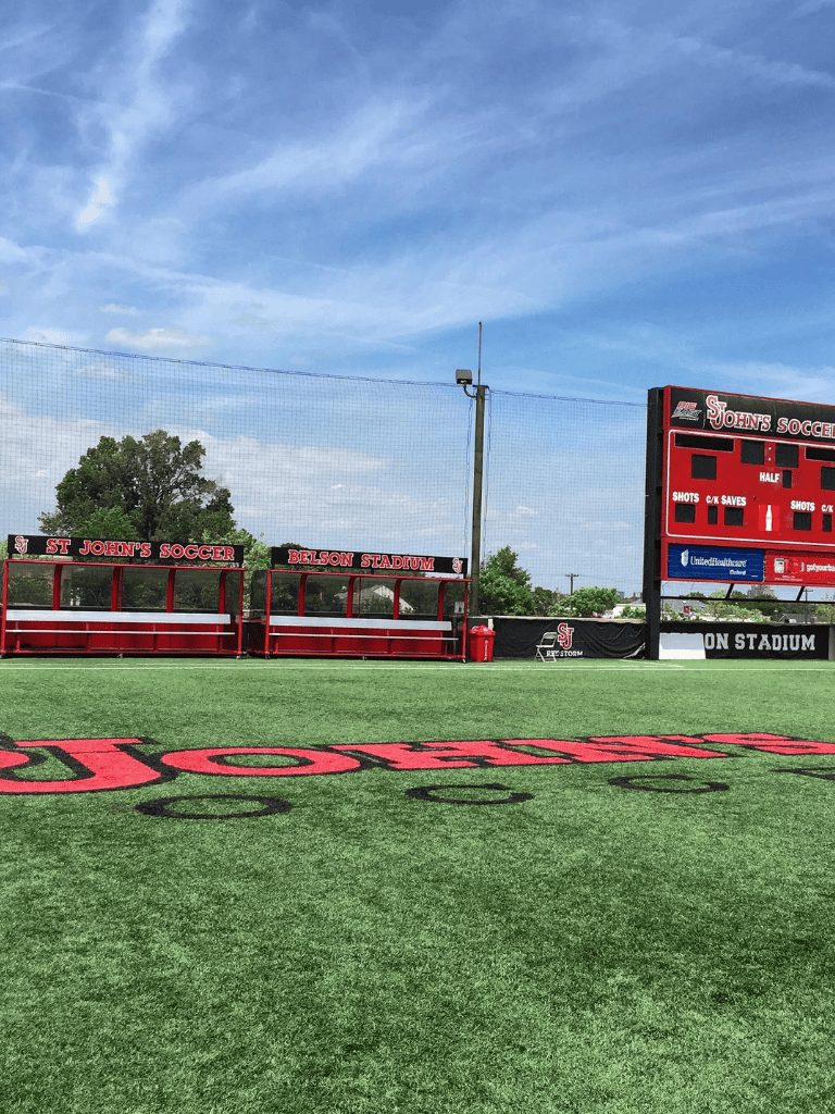St John's Soccer field at Belson Stadium with scoreboard and seating area, perfect for local sports events.