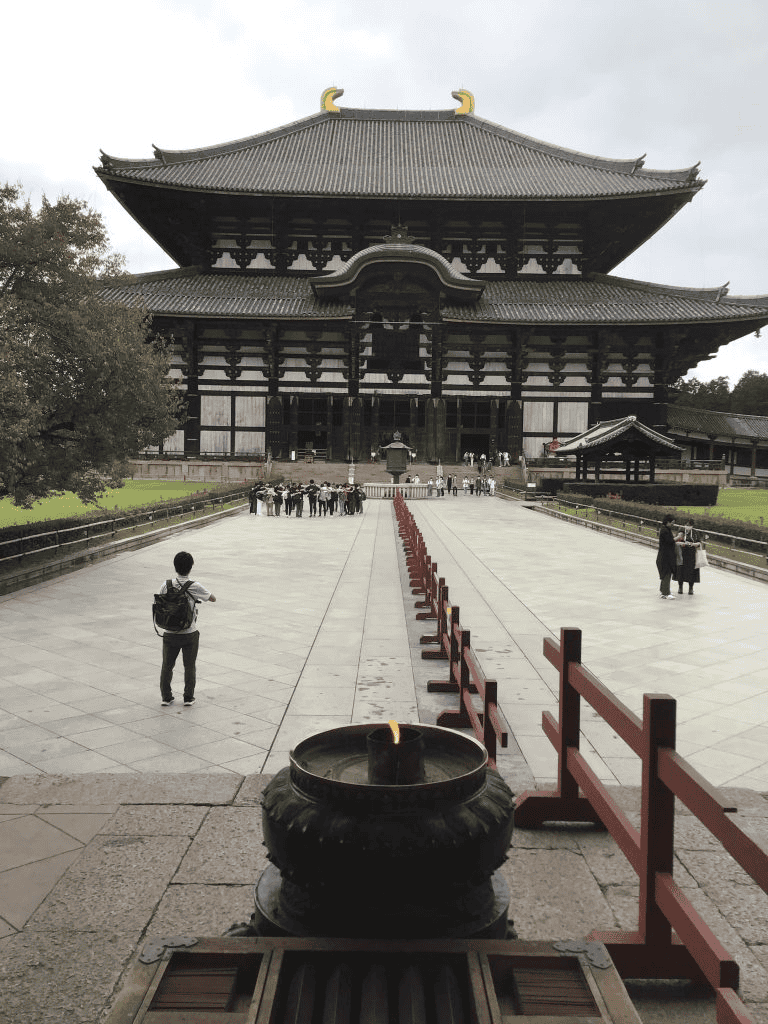 Ancient Japanese Buddhist temple with traditional architecture and peaceful surroundings.