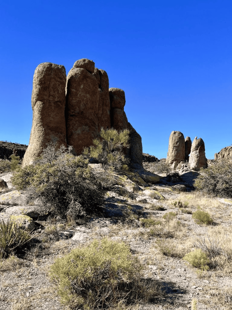 Ancient rock formations in the desert landscape, perfect for hiking and outdoor adventures.