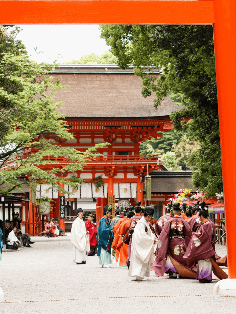 Colorful traditional Japanese wedding procession at Fushimi Inari Shrine, Kyoto, Japan.