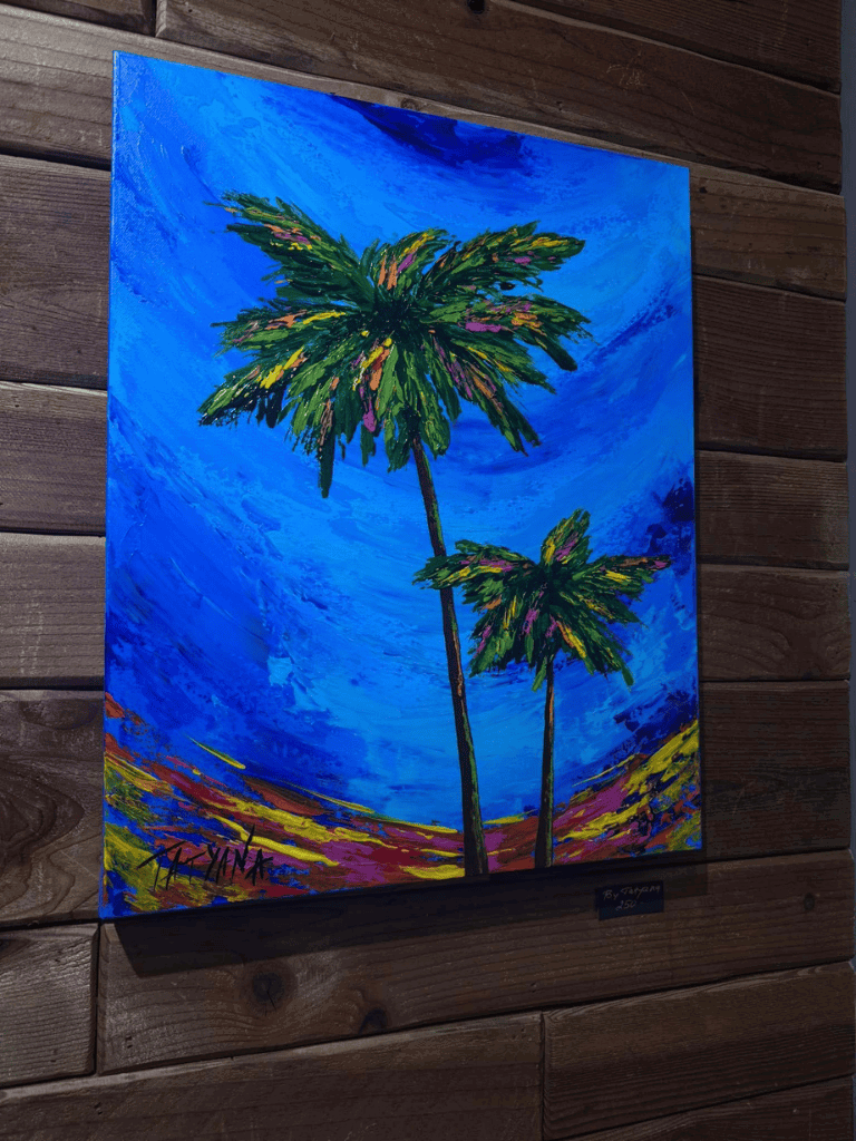 Vibrant palm tree artwork on canvas, tropical scene with bold blue sky, colorful landscape, and modern artistic style.