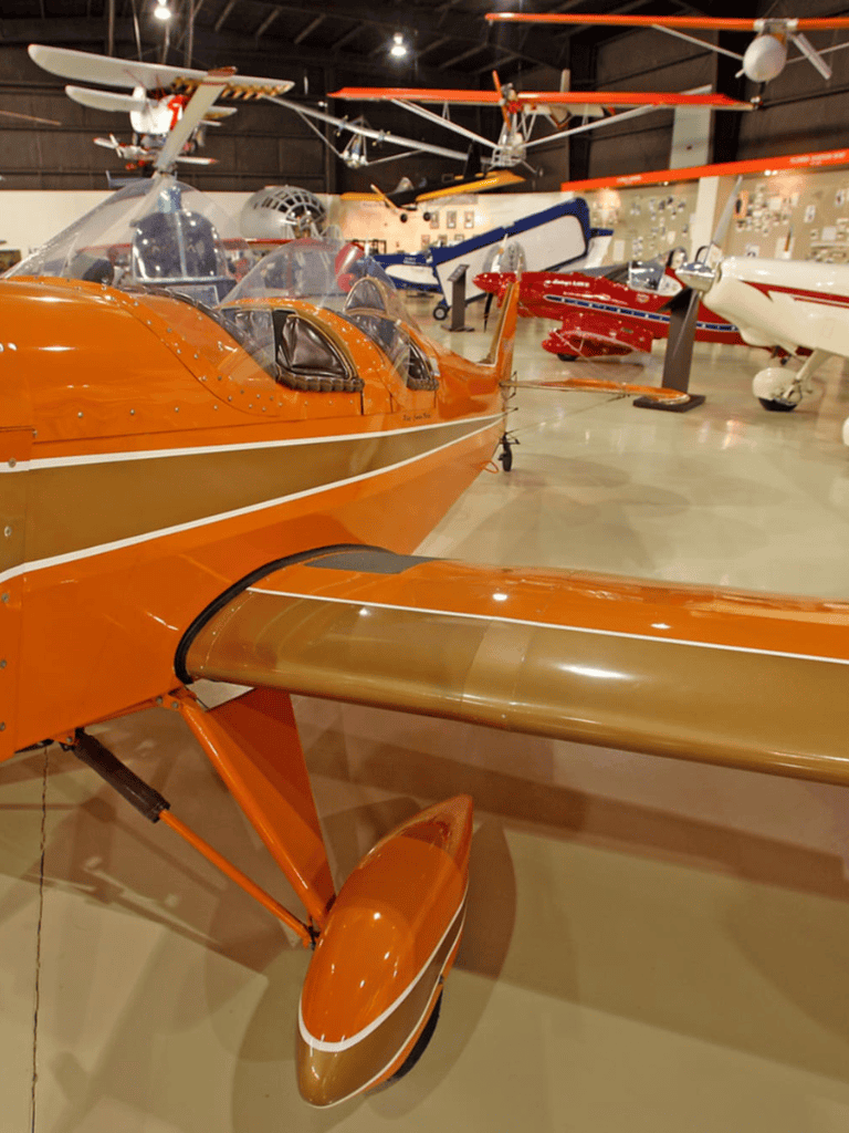 Colorful vintage aircraft collection at QuestForDirections aviation museum.