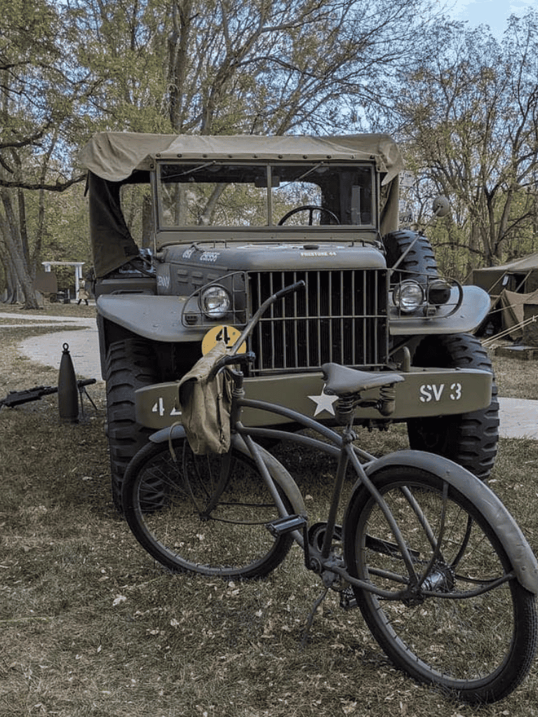 Vintage military Jeep vehicle at QuestForDirections outdoor display, historical off-road adventure vehicle.