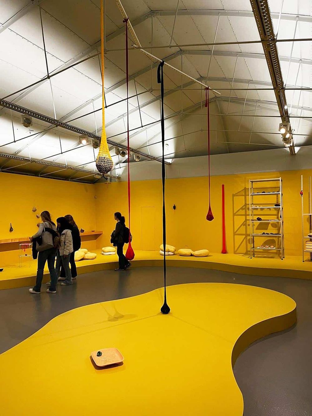 Colorful climbing and swinging exhibit at Quest for Directions, offering interactive navigation experiences.