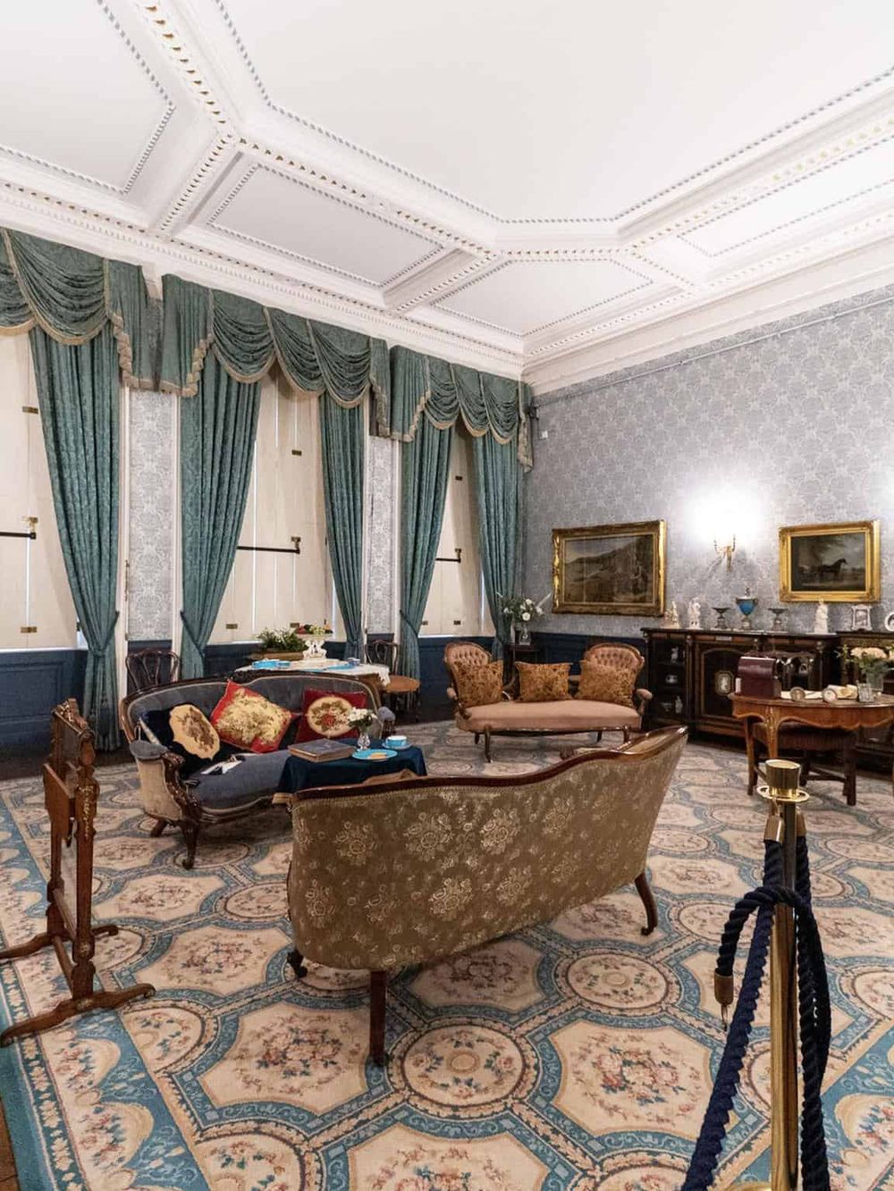 Elegant historic hotel interior with vintage furniture and ornate decor for travel planning.