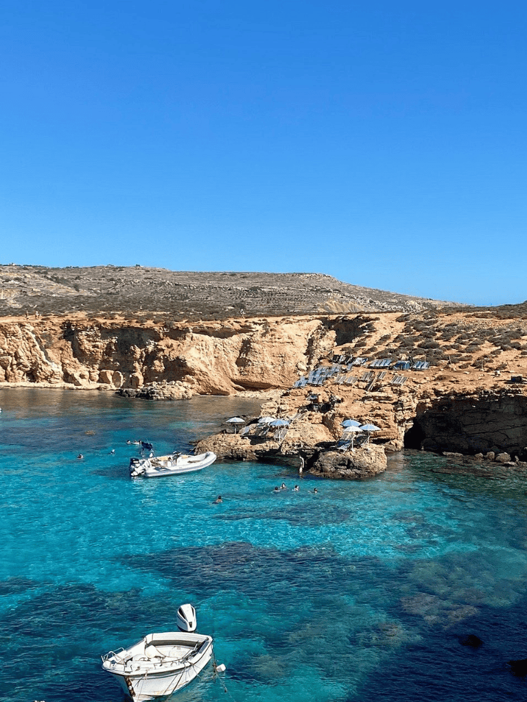 Relaxing coastal paradise with turquoise waters and scenic boat rides.