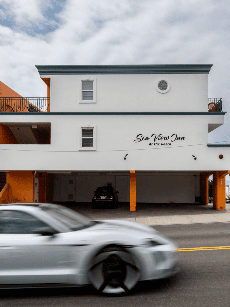 Modern beachfront hotel with parking and sea view balcony | QuestForDirections.