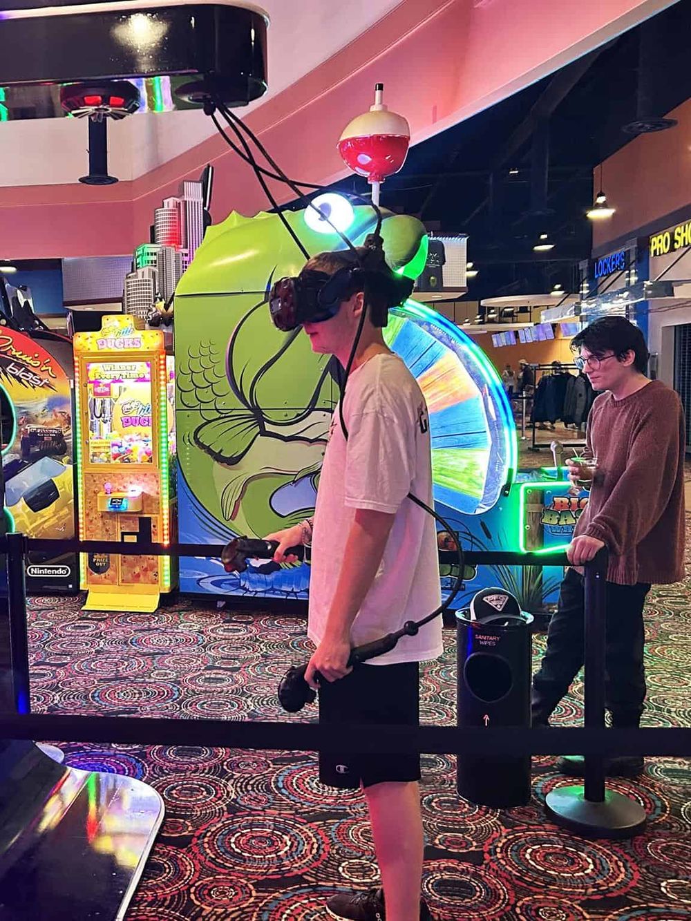 Immersive virtual reality gaming experience at Quest For Directions in a vibrant arcade setting.