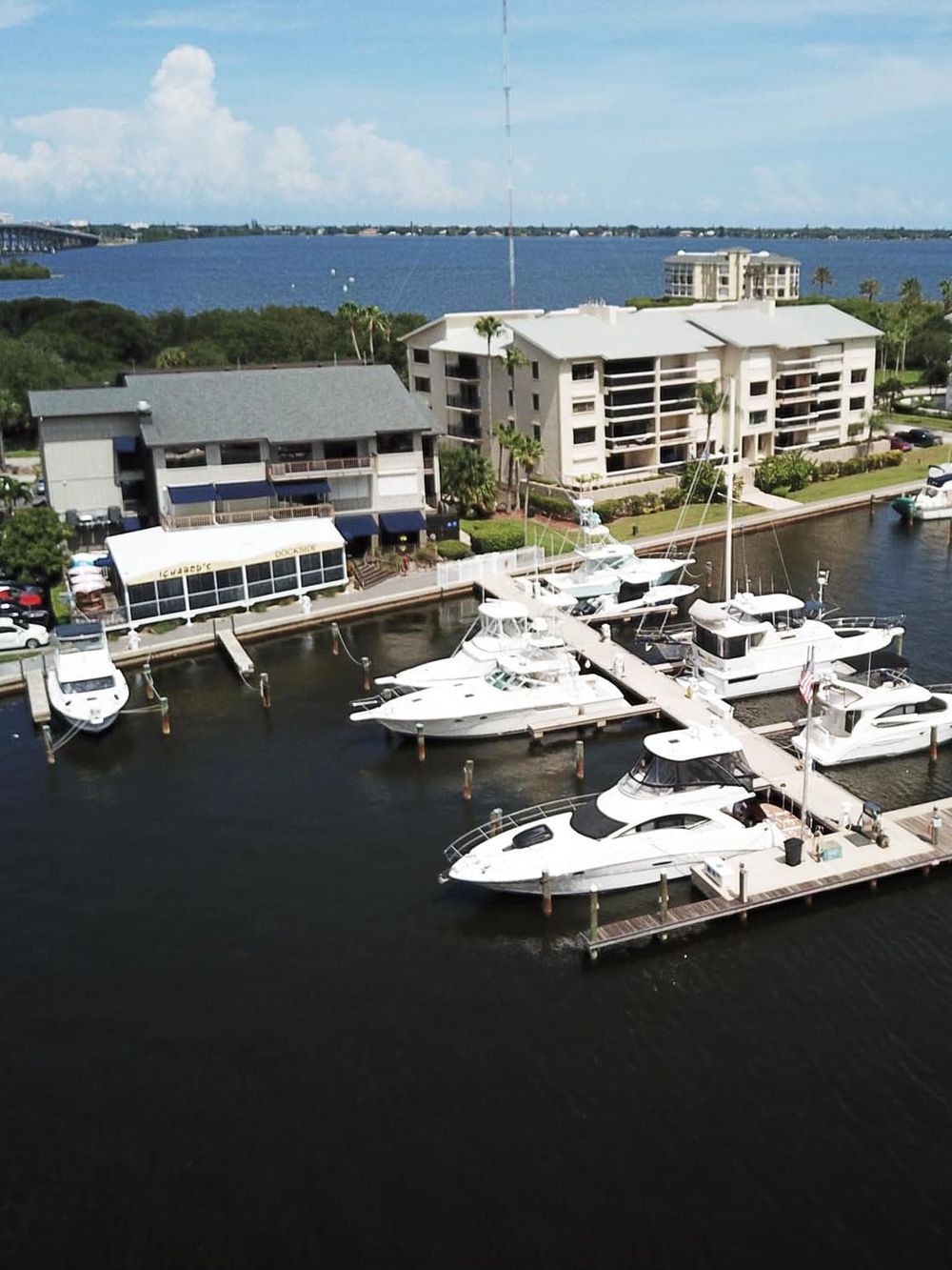 Luxury waterfront apartments with boat docks and scenic views in Florida.