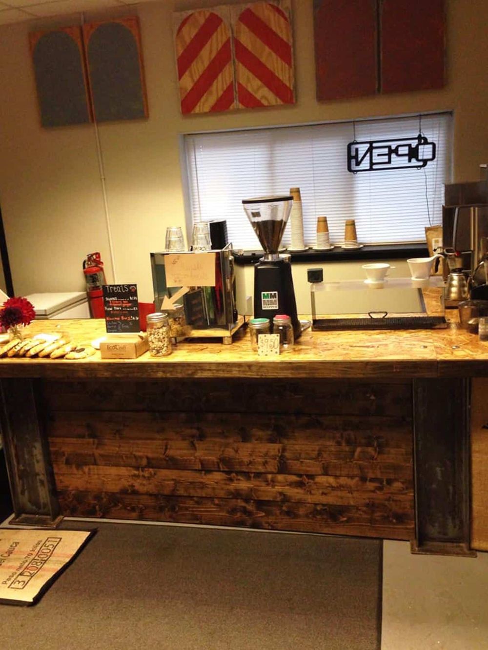 Freshly brewed coffee and snacks at a cozy cafe counter in QuestForDirections.