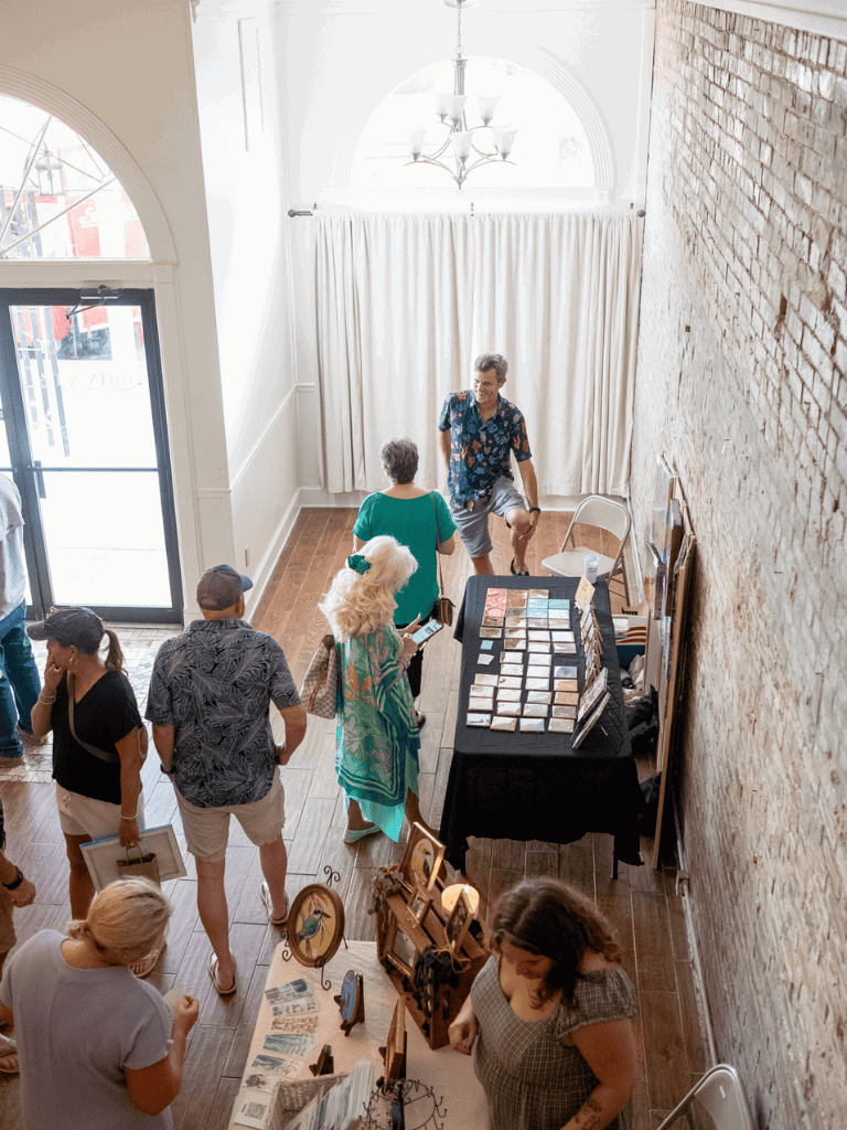 Vintage Market Event with Art and Jewelry Displays at QuestForDirections.