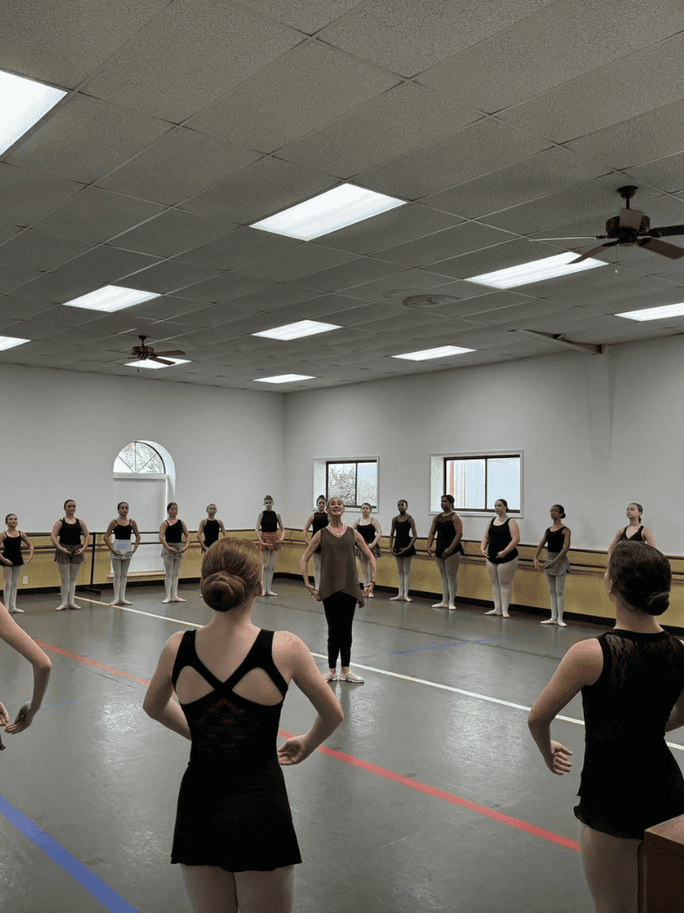 - Ballet class with students in a dance studio.