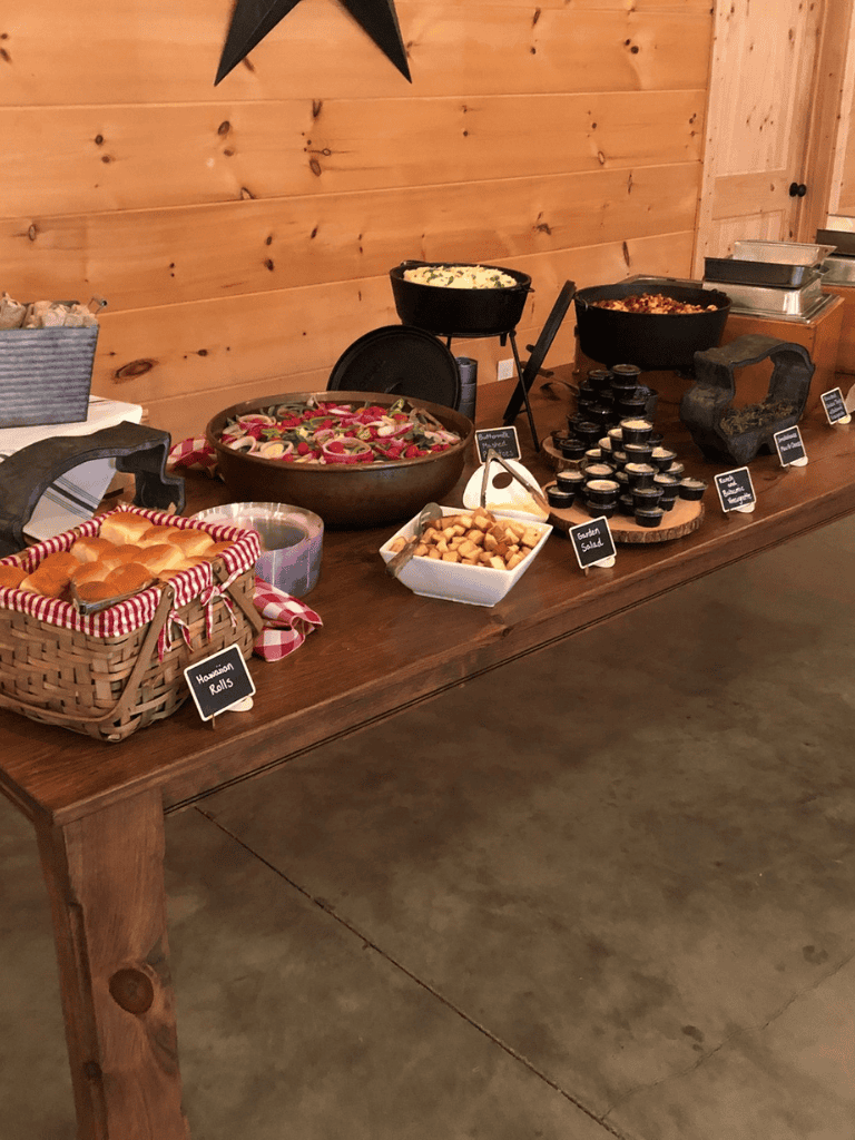 Fresh salad and food spread at QuestForDirections breakfast buffet, emphasizing healthy eating and catering services.