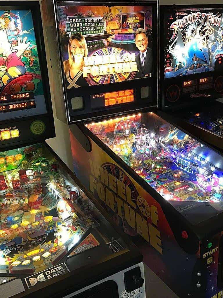 Bright arcade pinball machines with colorful lights and dynamic displays for entertainment and gaming fun.