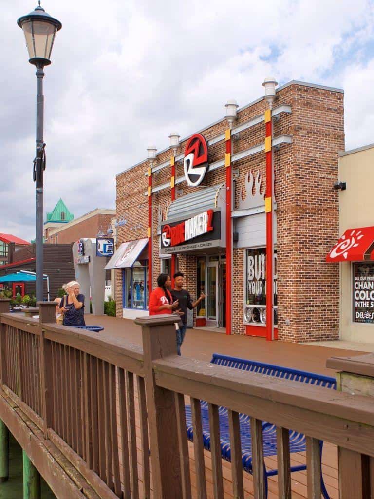 Outdoor shopping and dining area at Quest for Directions in a mall.