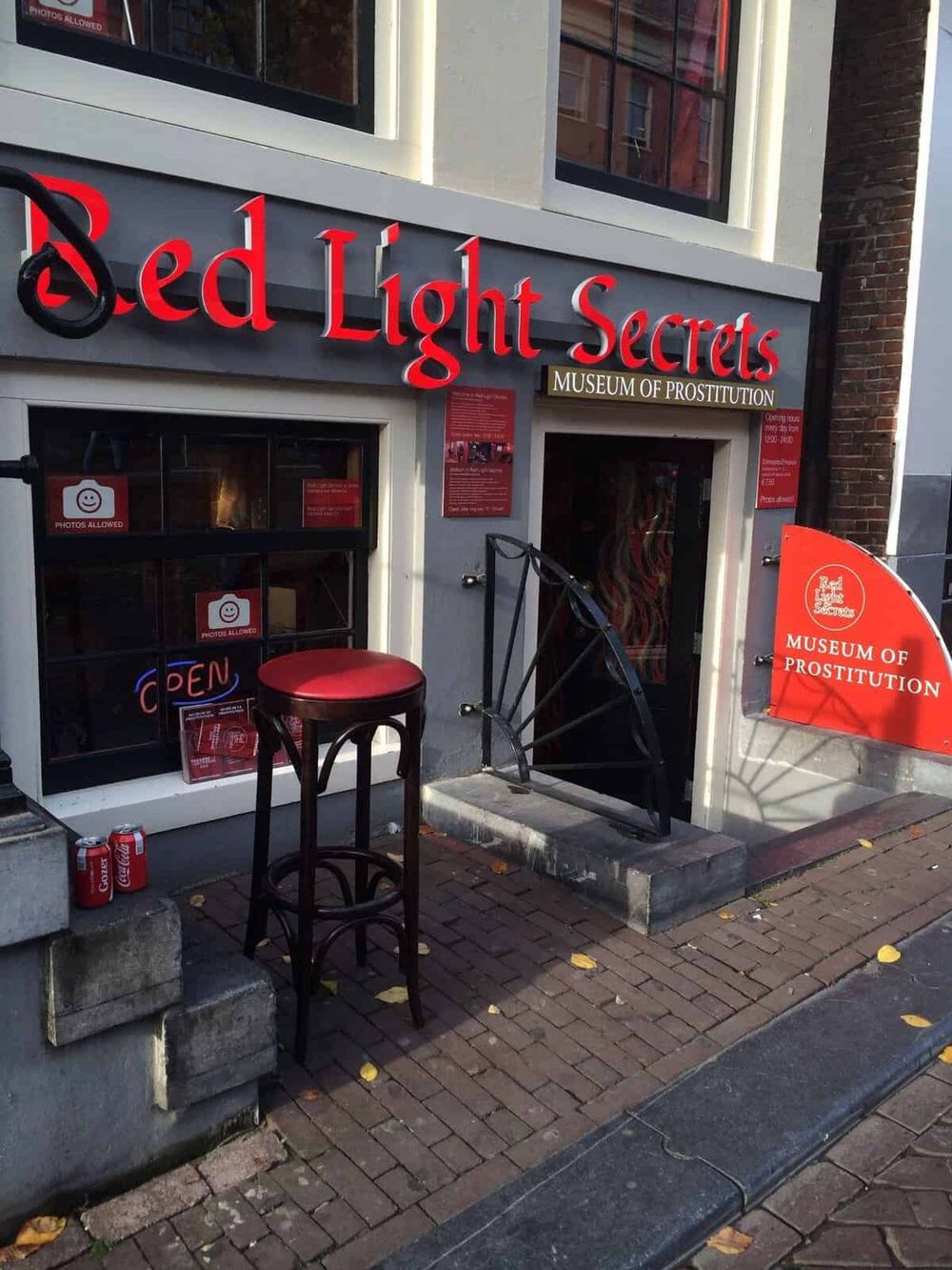 Red Light Secrets Museum of Prostitution storefront with signage and outdoor decor.