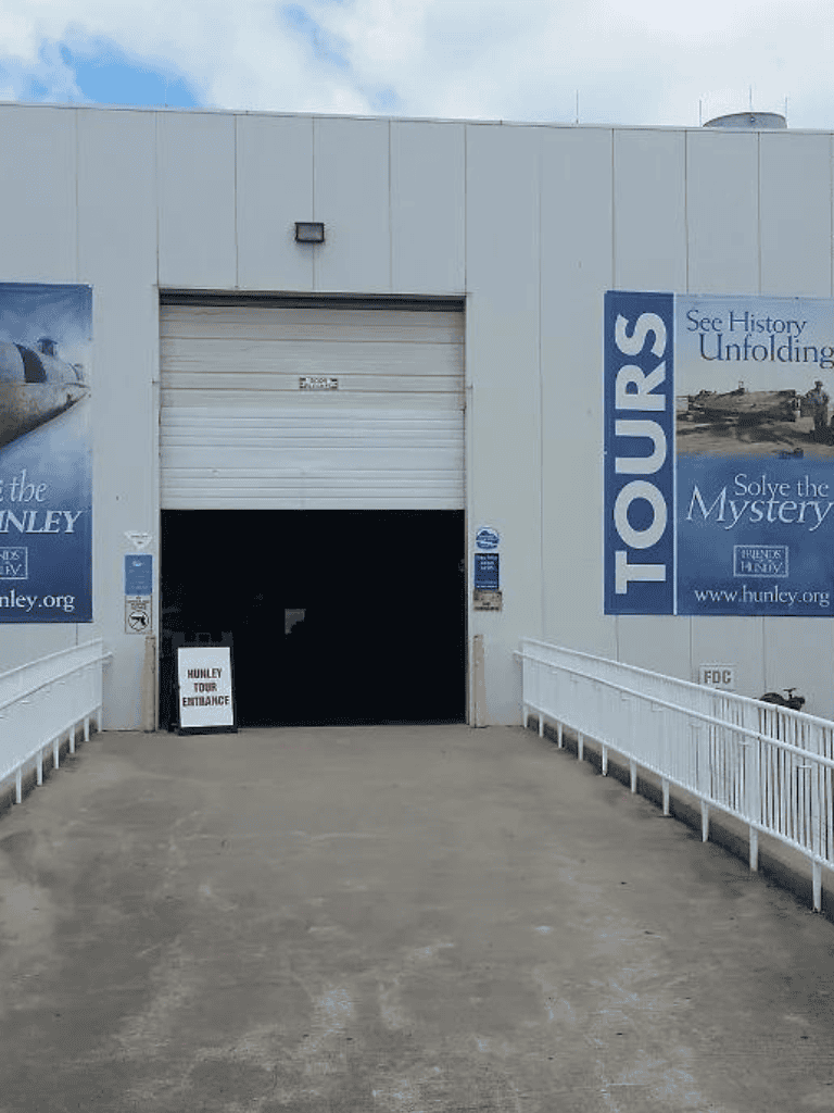 Aerial view of the entrance to Quest for Directions museum showcasing military history exhibits.